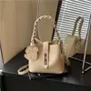 Bolsa Saco Estilo Cesta de Nicho Transfronteiriça para Mulheres 2026 Novo Modelo Simples Versátil Bolsa de Mão de Luxo Bolsa de Ombro Transversal