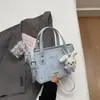 2026 Nuevo Bolso Tote Pequeño de Estilo Coreano con Colgante de Conejo Estrella para Mujer, Bolso Cruzado de Hombro Versátil con Acabado de Lujo, Bolso de Mano