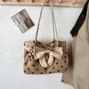Bolso de mano minimalista de lunares estilo coreano, nueva colección otoño 2026, diseño de nicho, bolso tote moderno y elegante para ir al trabajo