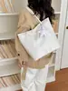Bolso de mujer con textura estilo western, nuevo y moderno bolso tote de gran capacidad primavera-verano 2026, bolso de hombro casual a la moda para el día a día