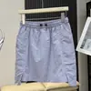 26 nova saia curta de verão ao ar livre estilo montanha cintura elástica absorvente de suor respirável anti-exposição bolso à prova d'água roupa de trabalho saia curta evasê