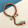 Xizang hecho a mano multicolor tejido cuerda de mano una familia de tres bestia traga oro pulsera de cuerda roja frotar a mano hilo de algodón reencarnación cuerda de mano