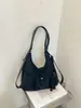 Bolsa de mano versátil para el día a día, gran capacidad, bolsa para mujer más vendida, mochila de moda nueva, bolso de hombro de nicho, bolso cruzado