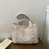 Bolsa feminina transfronteiriça, bolsa tote de cor sólida, novo modelo 2026, bolsa de mão casual simples, bolsa de ombro versátil casual prática