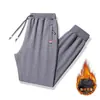 Pantalones de chándal de cordero con forro polar Ropa exterior engrosada Pantalones casuales cálidos Ropa exterior Pantalones deportivos para hombre 2024 Nuevo Invierno