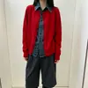 Suéter rojo con cuello polo y patchwork de mezclilla, nuevo diseño primavera 2026, suéter falso de dos piezas para mujer