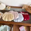 Shorts de verano para niñas, ropa de bebé elegante, pantalones bombachos con volantes de encaje únicos y modernos estilo coreano, pantalones cortos ajustados tipo falda
