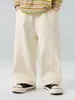 Valle del Viento 2026 Otoño Nuevo Estilo Coreano Gama Alta Pantalones Casuales de Algodón de Color Sólido para Niños Ajuste Holgado Pantalones de Pierna Curva para Niños