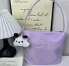 Bolso coreano de recuerdo Tela de nailon Bolso original para mujer Regalo Bolso de moda para mujer Bolso de axila Bolso de hombro versátil