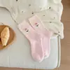 Meias de veludo australiano rosa para mulheres outono e inverno engrossadas meias quentes de tubo médio estilo japonês listrado de desenho animado meias de pelúcia fofas para mulheres