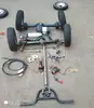 Carrinho de Mão Plano de Quatro Rodas Elétrico com Guidão Chassi Conjunto Completo de Acessórios Eixo Traseiro Eixo Dianteiro Versão Modificada Montagem do Chassi do Carrinho de Lanches