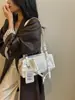 2026 Nuevo Bolso Cruzado de Hombro Único de Moda Versátil para Mujer Cuero Patentado Diseño de Nicho Bolso de Cadena Rojo Blanco Negro