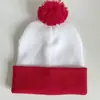 Gorro de bola de pelo roja en stock Gorro de Navidad gorro de bola de pelo de punto femenino Halloween combinación de colores gorro de lana gorro de orina
