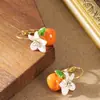 Pendientes de Flor de Caqui con Goteo de Aceite Fresco, a la Moda y Exquisitos, Estilo Coreano, con un Toque Lujoso y de Alta Gama