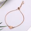 Pulsera ajustable retráctil de acero inoxidable 304 de AliExpress, con diseño de corazón para mujer, con letras DIY y grabado de sombras.