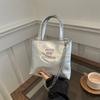 Bolso Pequeño Bordado Texchy Nuevo Modelo Primavera Verano 2024 Bolso de Mano Bolso Cruzado para el Hombro Bolso Cubo Casual Simple de Moda