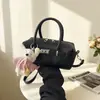 Bolsa de Mão Casual Fashion Bolsa Almofada para Mulheres 2026 Nova Bolsa Boston de Grande Capacidade para o Dia a Dia Bolsa Versátil de Ombro e Transversal