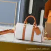 Tendencia de Moda Transfronteriza Europea y Americana Bolsa de Viaje Bolso Versátil Bolso de Hombro Cuero Genuino Bolso Tipo Cojín Boston Guangzhou