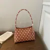 Bolsa de ombro elegante e versátil com poá texturizado estilo coreano 2026 nova moda de nicho com alto acabamento simples