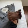 Bolsa de Mão Feminina de Luxo 2026 Novo Estilo Grande Capacidade Fashion Versátil Ombro Único Transversal Casual para Trabalho/Dia a Dia Bolsa de Axila