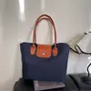 2026 Nueva Moda Popular Elegante Estilo Coreano Personalidad Ins Bolso Casual Bolso Tote de Hombro Axila Bolso Cruzado para Mujer
