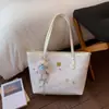 Bolsa de Ombro para Mulheres 2026 Nova Moda Bolsa Tote Menina Doce Bolsa de Mão Versátil de Alta Qualidade para Trabalho e Deslocamento