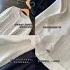 Camisa de Lino Estilo Francés Luna Blanca con Encaje Bordado, Cuello Redondo, Mangas Largas de Farol, Blusa para Mujer de Principios de Primavera L0319Y
