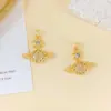 Colgante Más Vendido Collar de Planeta Colgante Cobre Micro-Pavimentado Circonita Super Brillante Diseño de Nicho Borrador No Se Desvanece Accesorios de Moda para Mujer