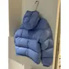 Jaqueta de Algodão Azul Acolchoada Estilo Casco de Tartaruga para Mulheres, Nova Coleção Outono/Inverno 2026, Casaco Quente Versátil com Capuz para Figuras Baixas, Tendência