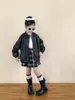 Outono 2026 Novo Estilo Coreano Roupas Infantis Jaqueta de Couro Preta Retrô para Meninas Jaqueta de Couro Macio com Gola Reversível Jaqueta de Couro PU