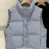 Chaleco acolchado de pana para mujer, estilo corto, versión coreana nueva de invierno 2024, cuello alto, chaleco holgado y moderno