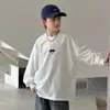 Camiseta blanca de manga larga para niño, modelo nuevo 2026, camiseta básica versátil para niños mayores en primavera y otoño, camiseta de moda al por mayor