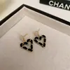 Aretes Geométricos Negros con Goteo de Aceite de Aguja de Plata Pendientes Franceses de Lujo Ligero de Alta Gama Pendientes de Diseño Retro Joyería al por Mayor para Mujeres