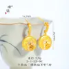 Loja de ouro Puzuo com ouro de areia incrustado com diamantes brincos de fivela Futai Ankang Ping An brincos de alto padrão com temperamento de luxo leve para mulheres