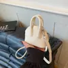Bolso de Mano Versátil de Nicho con Forma de Concha Transfronterizo para Mujer Modelo Nuevo 2026 Bolso de Hombro Simple de Alta Calidad para Viajes Diarios Bolso Cruzado