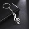 Moda europeia e americana personalizado Creative Car pingente decorativo corte titânio aço oco música nota chaveiro de aço inoxidável