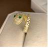 Anillo abierto creativo con forma de serpiente goteando aceite ajustable europeo y americano anillo de ojo verde amazónico anillo de esmeralda de lujo ligero con forma de serpiente