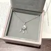 Collar Colgante Pluma Estrella Brillante de Zirconia para Mujer Nicho Lujo Ligero Sensación de Alta Gama Estilo Ins Versión Coreana Estilo Coreano Verano 2026