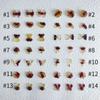 Venta al por mayor, gran oferta, joyería luminosa de resina para uñas de estilo dorado y rojo, con diseño de mariposa de dibujos animados, para manualidades, para usar en uñas hechas a mano.
