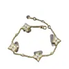 Marca de Luxo High-End Pulseira de Trevo de Quatro Folhas Redondo em Forma de Diamante, Flor de Quatro Pétalas, Flor de Cinco Pétalas para Mulheres, Madrepérola Branca, Madrepérola Rosa, Modelo Popular, Vendas Diretas por Transmissão ao Vivo
