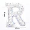 Venta caliente transfronteriza de 26 pegatinas de tela con forma de estrella de cinco puntas y letras de perla para ropa, sombreros y bolsos, materiales decorativos.