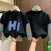 Camiseta de manga larga para niño 2026 nueva ropa de otoño para niños, camiseta básica de algodón puro de imitación de dos piezas para niño, top para niños mayores