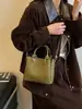 Bolsa pequena de padrão trançado mais vendida internacionalmente para mulheres, nova bolsa balde versátil da moda retrô 2026, bolsa de ombro e transversal