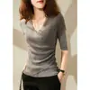 Ropa Nueva para Mujer 2025 Primavera y Verano Tops de Cuello en V Tejidos Asimétricos Camisetas de Manga Corta Europeas Ajustadas y de Moda