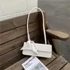 Bolso tipo baguette con diseño de nicho texturizado para mujer, Nuevo de Moda Primavera/Verano 2026, Bolso de Mano de Bufanda de Seda, Bolso Pequeño Cuadrado, Bolso de Hombro