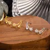 Pendientes de botón de circón estilo meteoro minimalista de moda transfronterizos, Pendientes de estrella y luna de estilo nuevo fresco para chica de moda