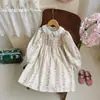 Compras en el Extranjero Ropa Infantil Estampado Francés Vestido de Niña Fruncido Estilo Primavera 2026 Cuello de Muñeca Dulce Manga Larga Falda de Princesa