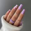 Uñas postizas de longitud media con diseño de vaca lechera moteada en lavanda estilo ins europeo y americano para usar al por mayor