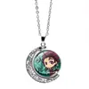 Cazador de demonios: Kimetsu No Yaiba Kamado Nezuko Collar de Luna Giratoria Periférico de Anime Colgante Giratorio de Doble Cara Cadena para Suéter