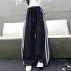 Calças Casuais de Outono para Meninas Médias e Grandes Primavera e Outono Novas Roupas Infantis Calças de Moletom Esportivas para Meninas Soltas Versáteis Estilosas Tendência